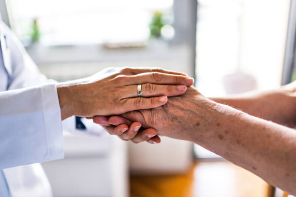 istock Healthcare worker at home visit 1254212912