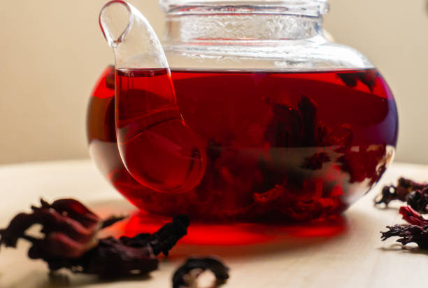 istock Closeup view on red hibiscus tea in teapot 1254215114