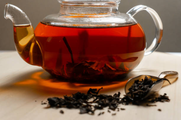 istock Brewed black sri lanka tea in transparent teapot 1254215253