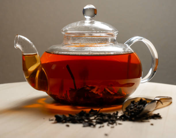 istock Indian black brewed hot tea in teapot 1254215274