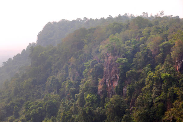 View into landscape from 3 whale rocks Buang Khan Thailand in province Nakhon Phanom. Rocks are said to be 75 million years old. Dusty smog air day
