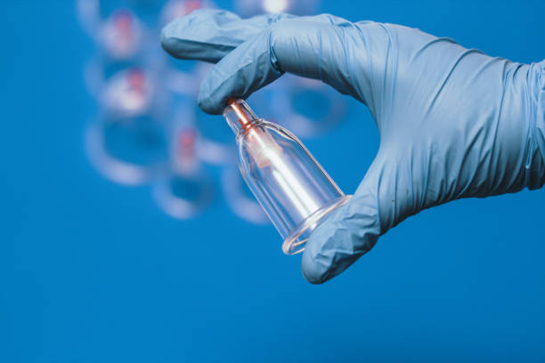 istock Jars for hijama. Vacuum pumps on a blue background 1254220259
