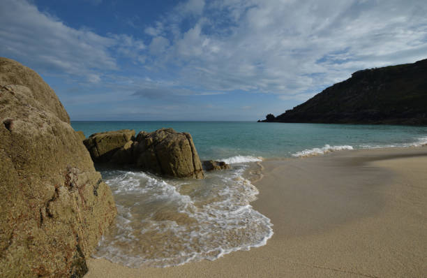 istock Porthcurno Beach Cornwall at sunset 1254221726