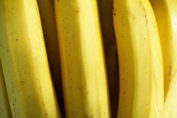 istock Macro view on fresh ripe yellow bananas bunch 1254222618