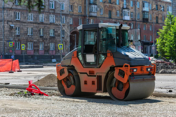 istock Paver operation during road repair and leveling 1254224380