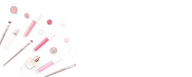 istock Trendy design template with pink cosmetics layout on white background. Flat lay style. Copy space. Web banner. 1254226697