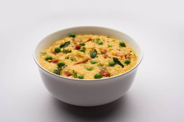 istock Dalia khichdi or Daliya Khichadi is a delicious one pot meal made from broken wheat and vegetables, Indian food 1254226708