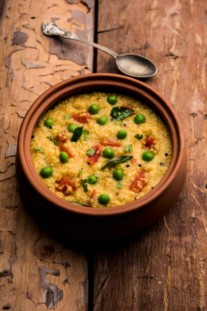 istock Dalia khichdi or Daliya Khichadi is a delicious one pot meal made from broken wheat and vegetables, Indian food 1254226832