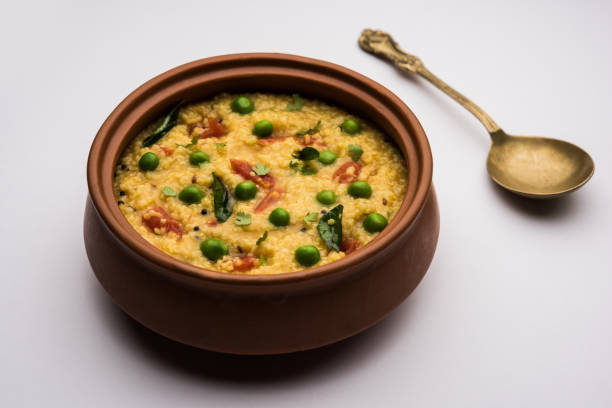 istock Dalia khichdi or Daliya Khichadi is a delicious one pot meal made from broken wheat and vegetables, Indian food 1254227643