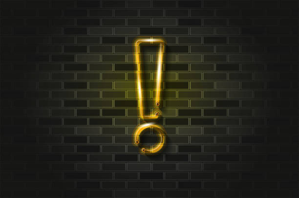 istock Exclamation point yellow glowing neon sign or glass tube on a black brick wall. Realistic vector art 1254227659