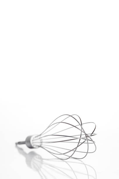 whipped cream and whisk with clipping path.