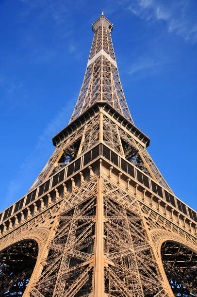 istock Eiffel Tower shining in the beautiful blue sky 1254237004