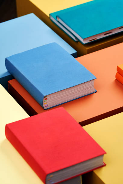 istock Education concept with books stacked on pastel color background 1254239088