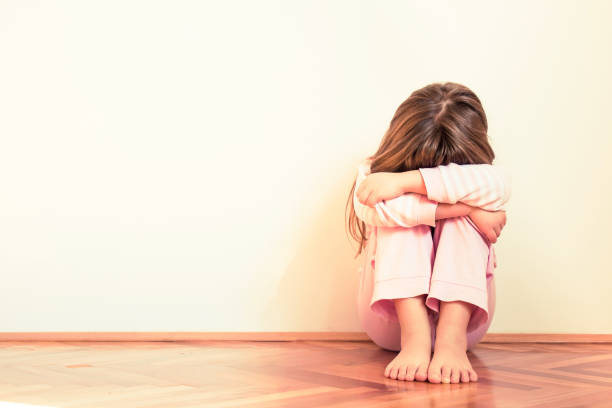 istock Sad and disappointed little girl. Emotion problems. Copy space 1254241441