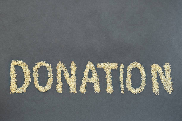 istock the word donate made from cereals on a black background 1254247224