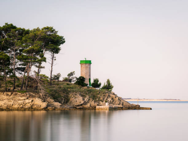 Lighthouse Porer against Clear Summer Day Sky at Sunset in Kamenjak, Croatia