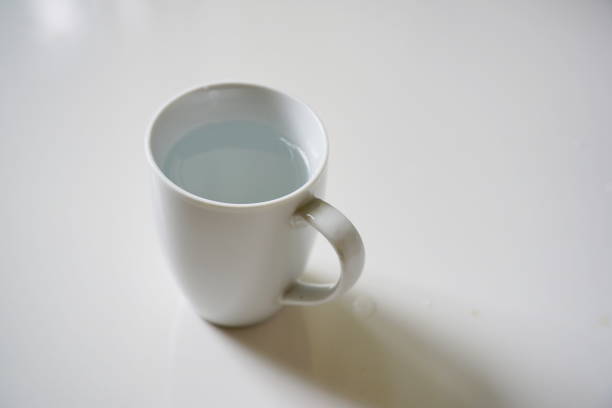 istock white water mug on table in home 1254254659