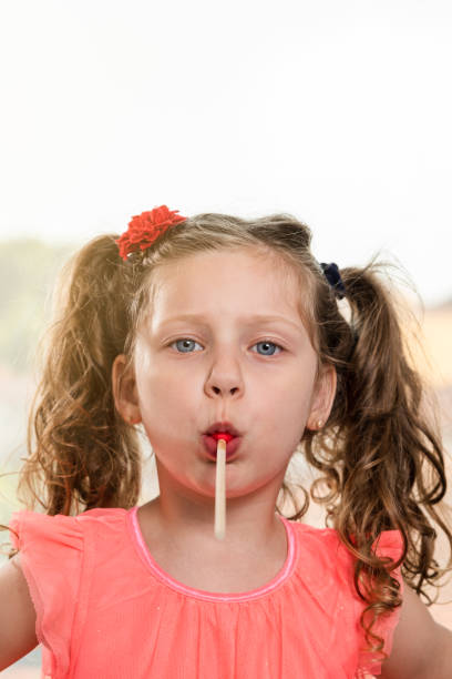 istock front view of a cute little girl 1254257658