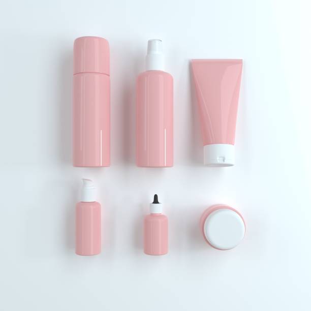 istock Realistic cosmetic pink bottles design on light white background. Cosmetic cream containers and tubes for cream, lotion, shampoo, gel, balsam, conditioner, spray. 3D Rendering. 1254267190