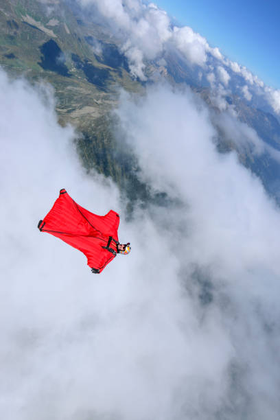 He flies down into valley in the shadows