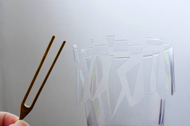 Image of a cup that breaks in resonance with the tuning fork