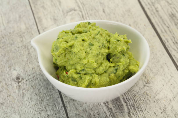 istock Avocado guacamole sauce with chili pepper 1254269252