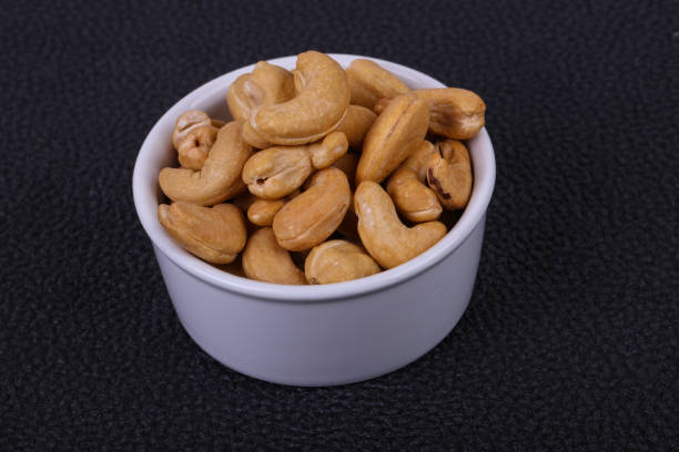Tasty Cashew nuts heap in the bowl