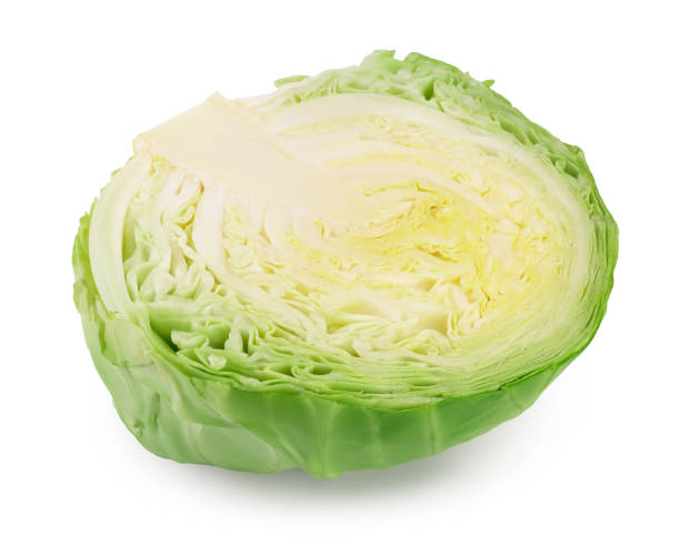 istock Green cabbage half isolated on white background with clipping path and full depth of field. 1254270784