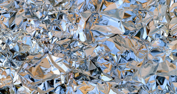 istock Abstract background texture of crumpled aluminum foil. 1254273042