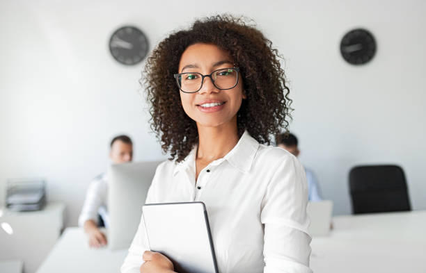 istock Black business consultant smiling for camera 1254275050