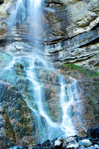 istock Mountain Waterfall in Utah Mountains with Long Exposure to Show Blurred Motion 1254276701