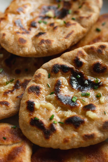 istock Homemade Indian Naan Flatbread made with Whole Wheat 1254277091