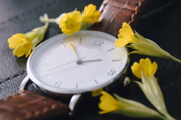 Watch with small yellow flowers