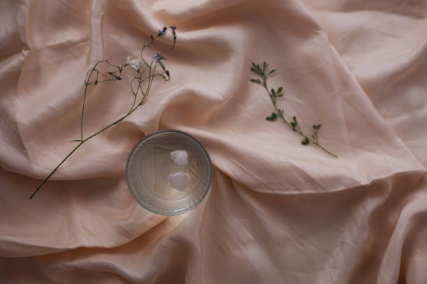 istock glass of water on bed 1254279106