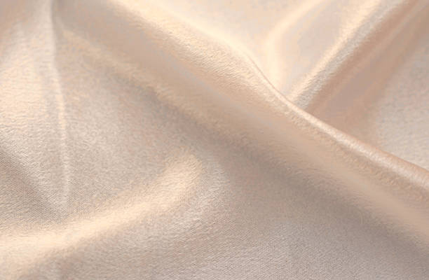 istock Smooth elegant golden silk can use as wedding background 1254279129