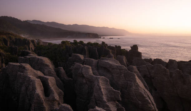 istock Unusual rock formations on ocean´s coast shot during sunset 1254282365