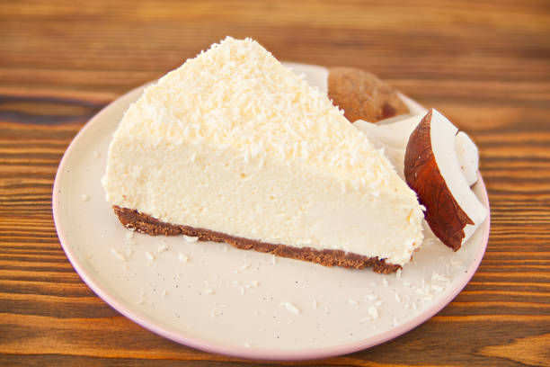 istock delicious cheesecake with coconut on  plate 1254288662