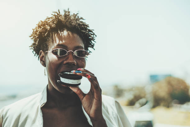 istock African girl eating an ice cream 1254291999