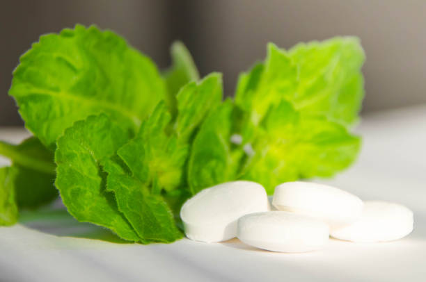 istock pills and mint for health. mood improvement 1254293746