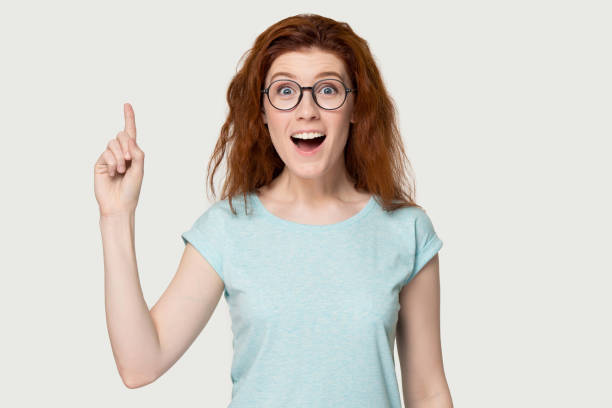 istock Excited attractive young woman having good idea. 1254296722