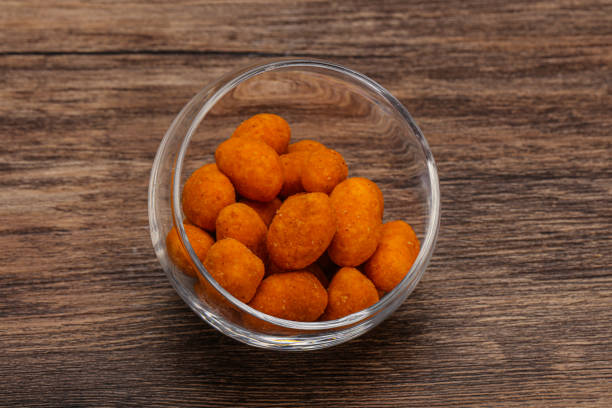 istock Spicy peanut heap in the bowl 1254303947