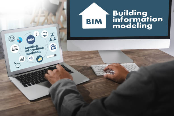 BIM Business team hands at work with financial reports BIM - Building information modeling  and a laptop BIM Business team hands at work with financial reports BIM - Building information modeling  and a laptop building information modeling photos stock pictures, royalty-free photos & images