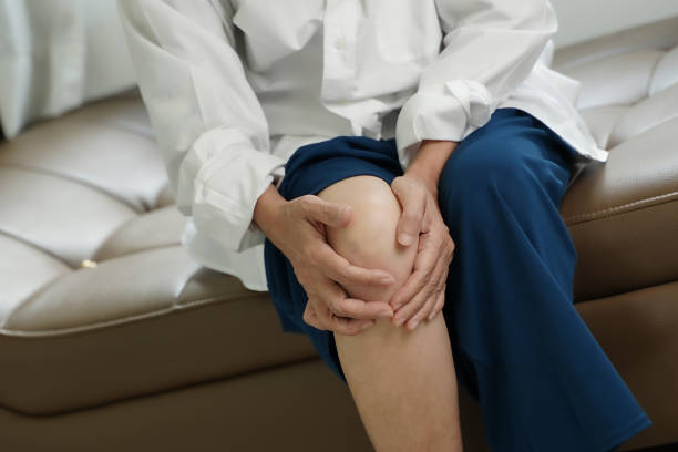 istock Elderly woman suffering from pain From Rheumatoid Arthritis 1254309340