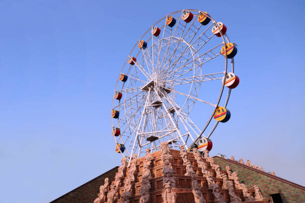 istock A big swing at amusement park 1254314635