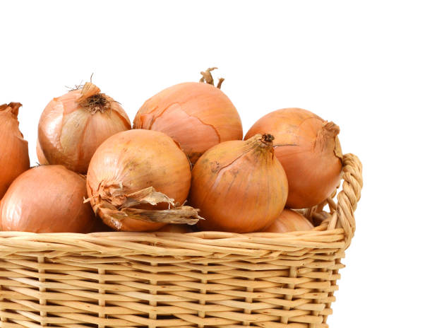 istock fresh onions vegetables isolated in basket on white background 1254318934
