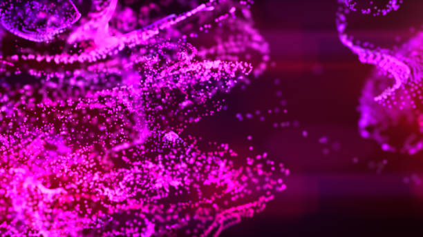 istock Fluid pink and purple particles flowing beautiful abstract background, Liquid and light with depth of field. 1254324017