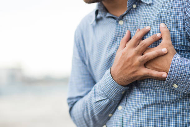 istock Hand man in the chest, squeezing his heart He had a sudden heart attack. 1254325549