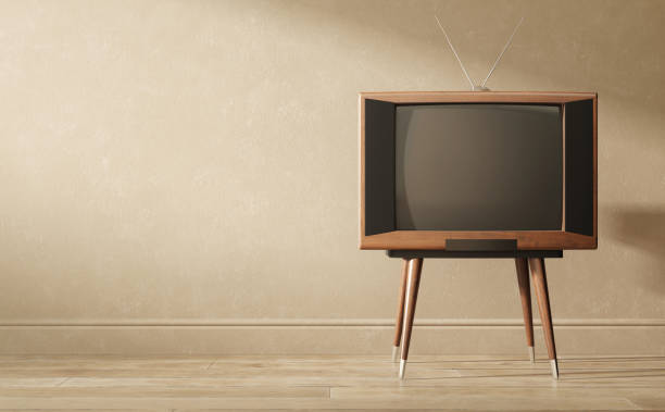 istock Wood vintage television receiver on a brown background. 1254345499