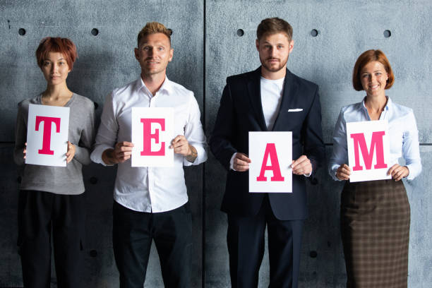 istock Business people holding TEAM 1254347544