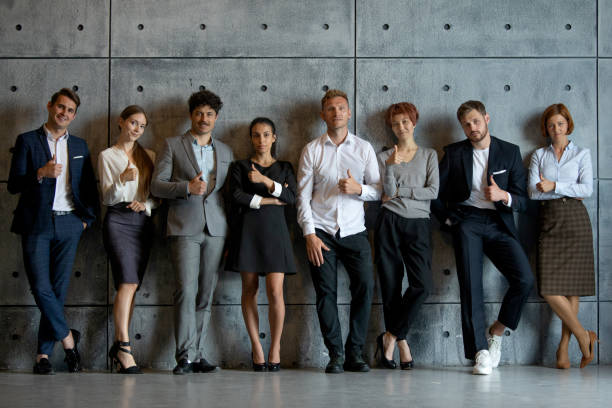 istock Business people team with thumb up 1254347651